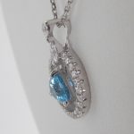 side view of aquamarine and diamond pendant