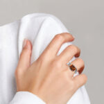 white gold citrine and diamond ring on finger