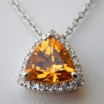 triangular citrine and diamond halo pendant in white gold setting