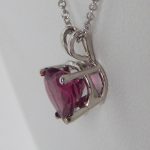 side view of garnet heart pendant