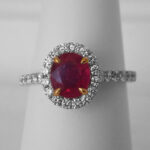 white gold ruby and diamond halo ring