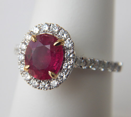 ruby and diamond halo ring in white gold
