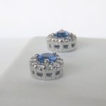 side view of white gold sapphire and diamond stud earrings