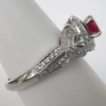 side view of white gold ruby and diamond ring