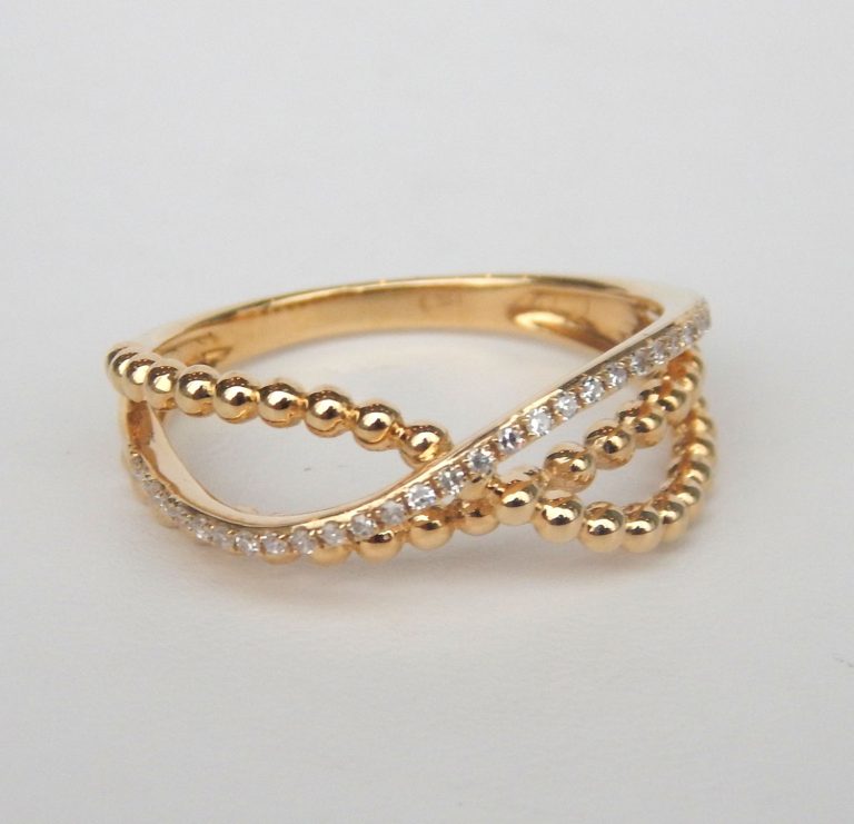 yellow gold twisted diamond ring