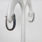 white gold sapphire cluster huggie earrings side view