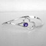 sterling silver heart bangle with a round amethyst in the center