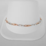 white gold and rose gold infinity link bracelet