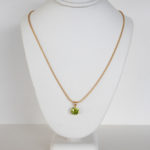 peridot pendant necklace in yellow gold