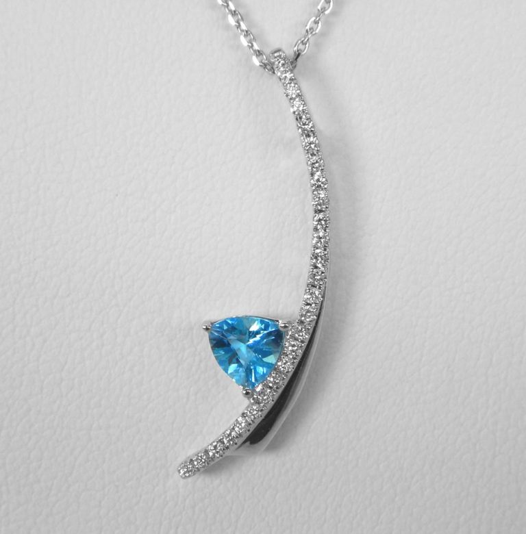white gold blue topaz and diamond pendant
