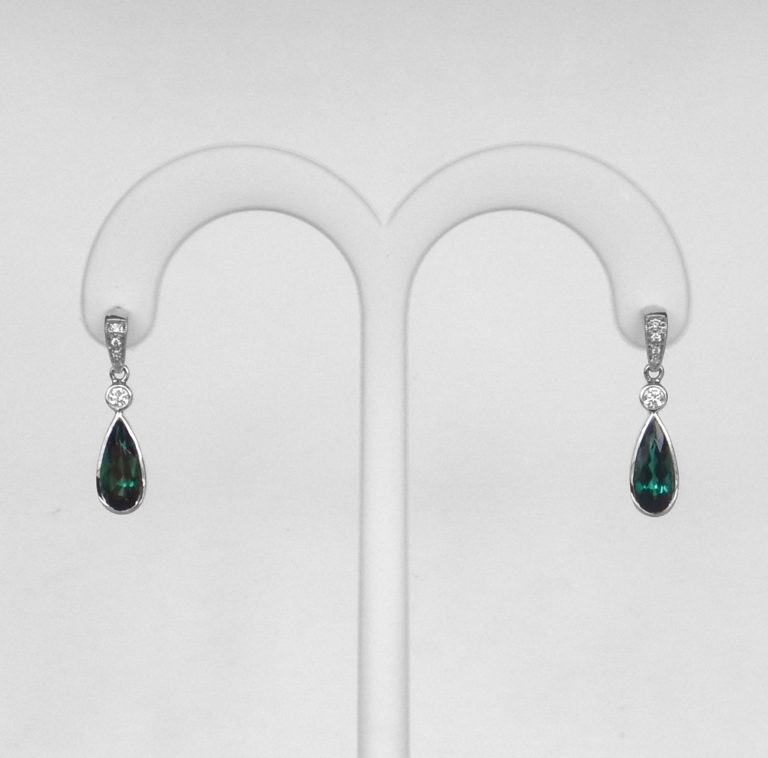 green tourmaline and diamond earrings in white gold setting