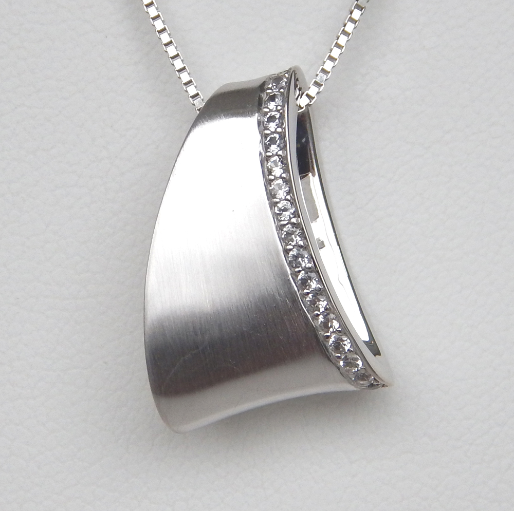 white sapphire pendant