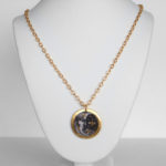 yellow gold leaf sun and moon double sided pendant