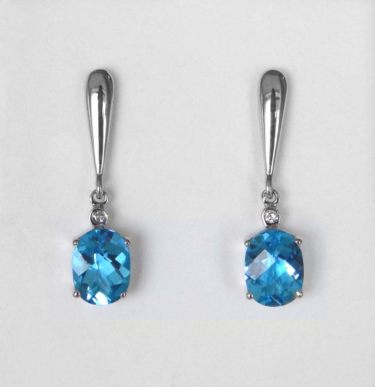 white gold blue topaz dangle earrings