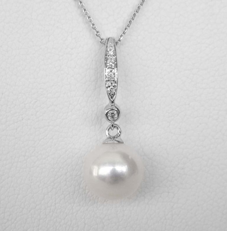 white gold pearl and diamond drop pendant