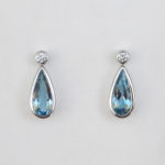 white gold aquamarine and diamond dangle earrings