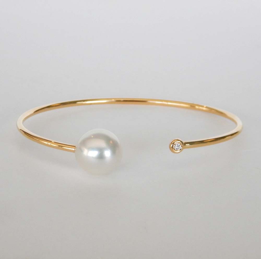 yellow gold pearl and diamond bangle bracelet