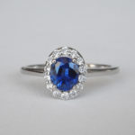 white gold oval sapphire and diamond halo ring