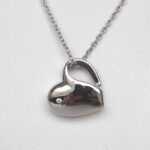 close up view of sterling silver diamond heart pendant