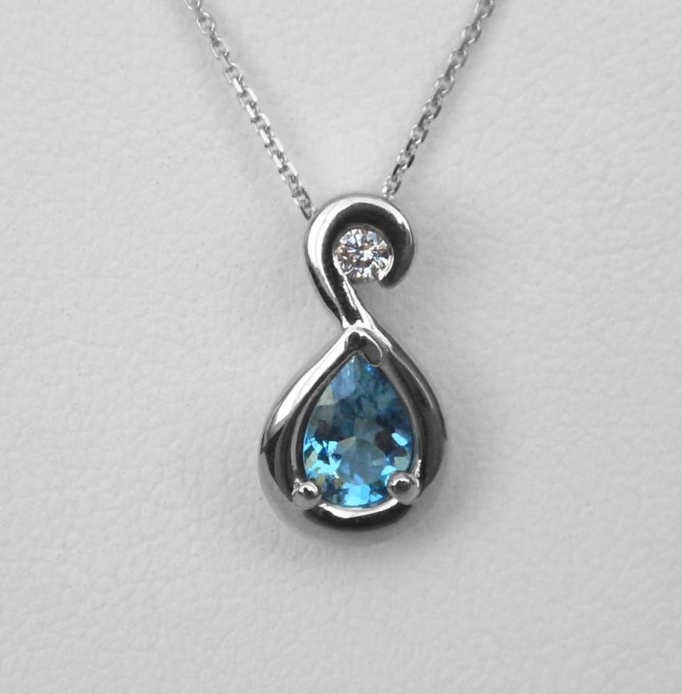 blue zircon and diamond pendant