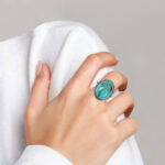 sterling silver turquoise ring on finger