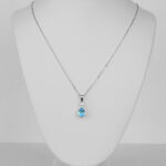 white gold blue topaz and diamond necklace
