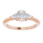 rose gold three stone pear shape side stones engagement ring