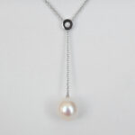 white gold pearl and diamond pendant
