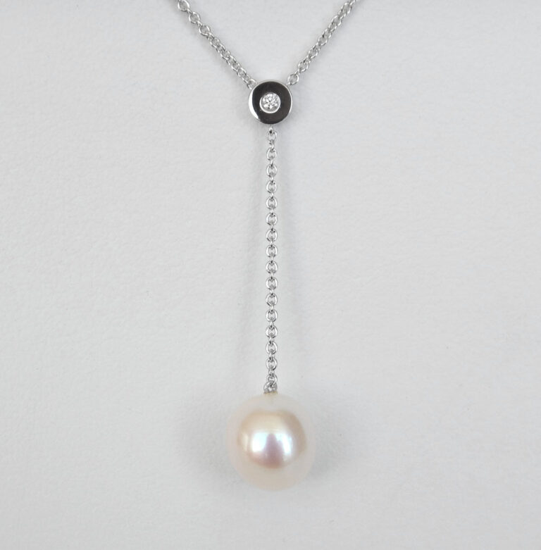white gold pearl and diamond pendant