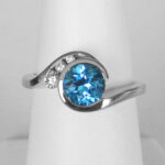 white gold blue topaz and diamond ring