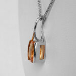 side view of white gold citrine pendant