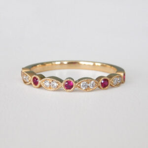 yellow gold ruby and diamond band