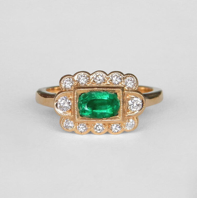 yellow gold emerald and diamond ring