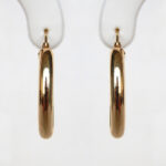 yellow gold oval hoop earrings