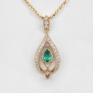 yellow gold art deco emerald and diamond pendant