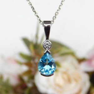 blue topaz and diamond pendant