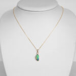 yellow gold opal and diamond pendant on chain