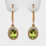 yellow gold peridot dangle earrings