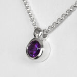 side view of sterling silver amethyst necklace