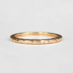 yellow gold band with hammered finish