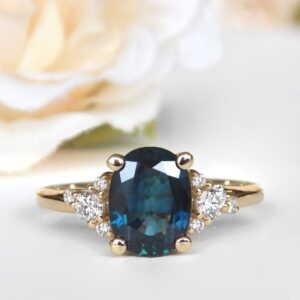 yellow gold oval sapphire and diamond engagement ring