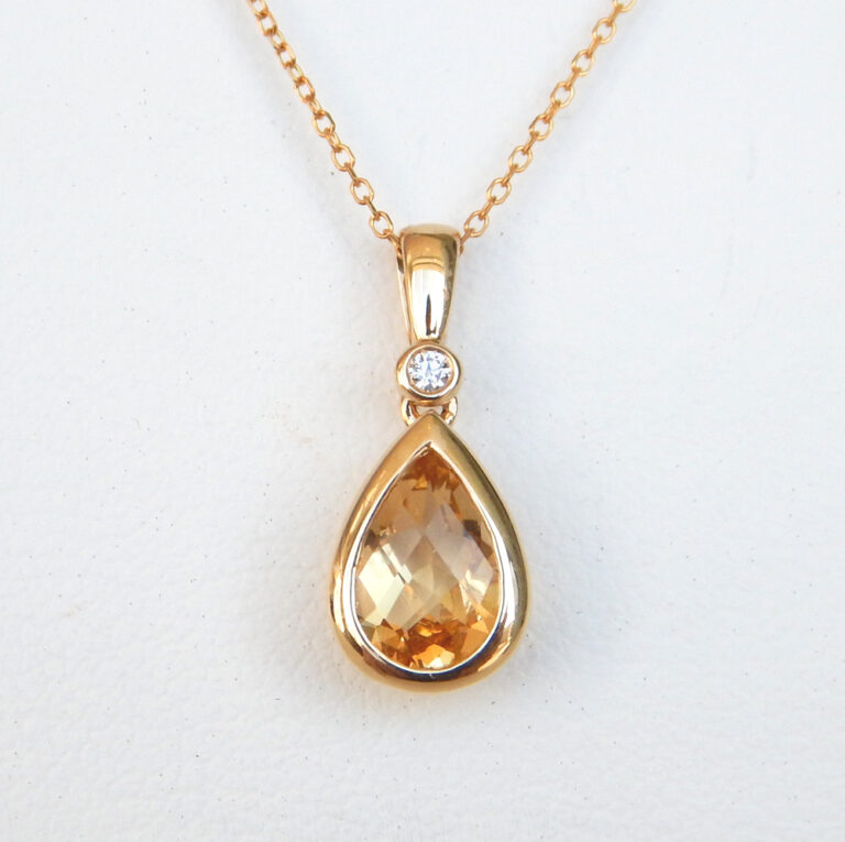 pear shape citrine and diamond pendant