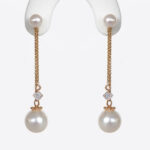 pearl and diamond dangle earrings in yellow gold