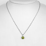 white gold peridot pendant on necklace chain
