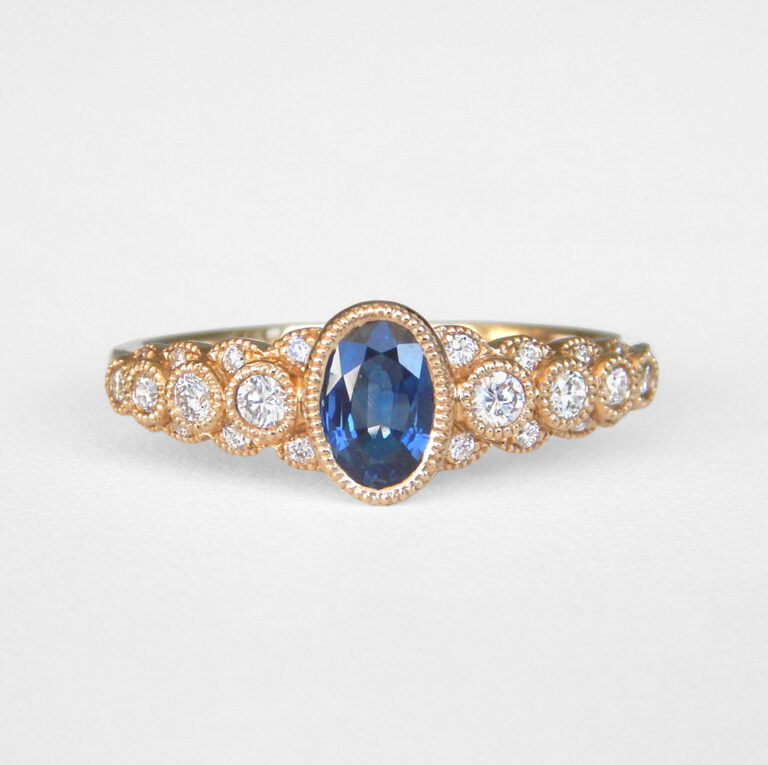 yellow gold oval sapphire and diamond ring