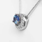 side view of white gold sapphire and diamond moon pendant