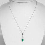 emerald and diamond pendant on platinum chain