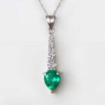 platinum emerald and diamond drop pendant