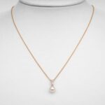 yellow gold pearl and diamond pendant on chain