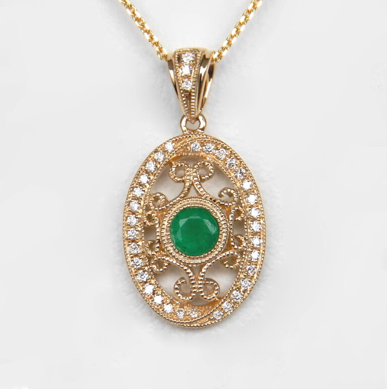 yellow gold emerald and diamond art deco pendant
